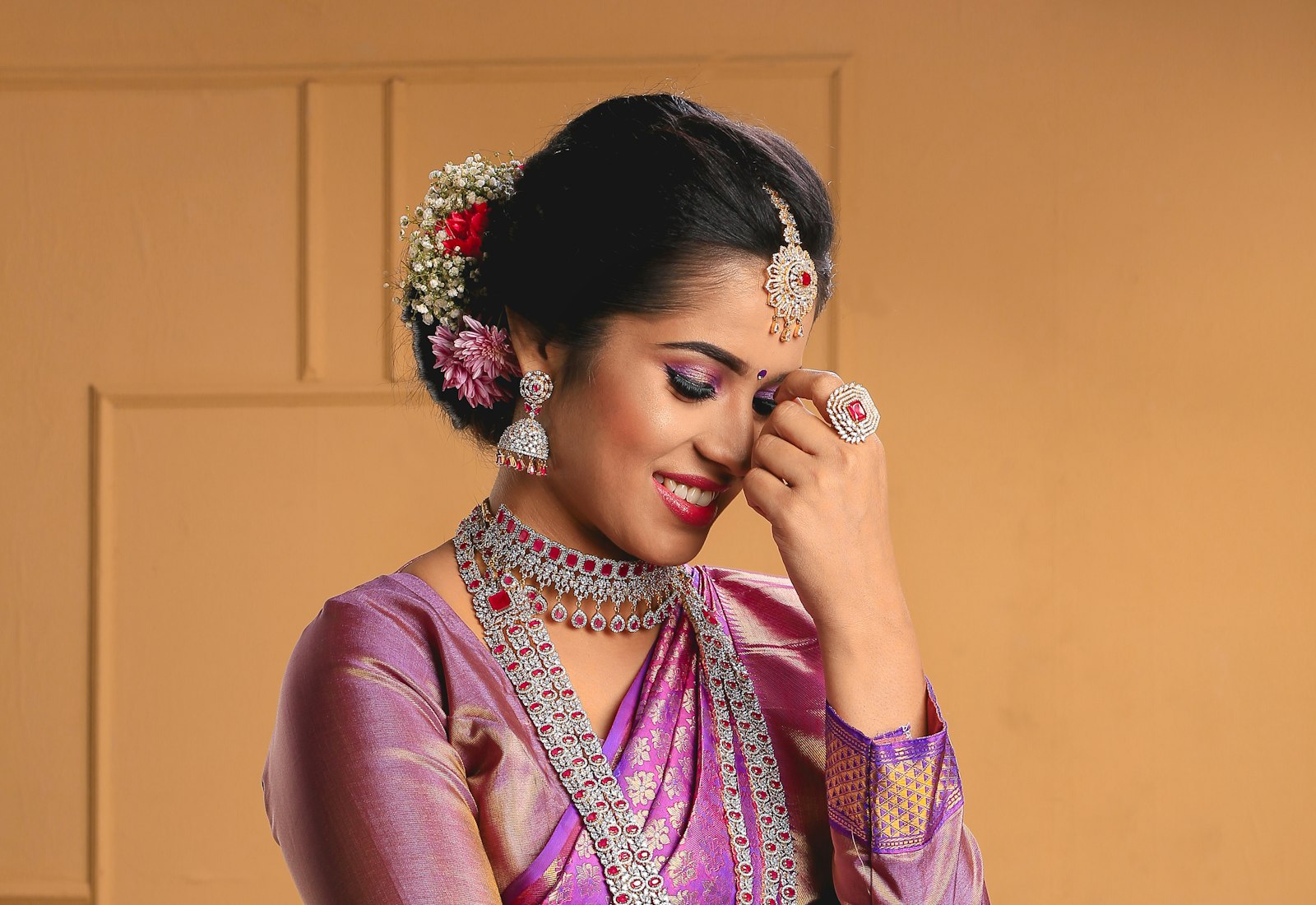 Woman in a purple Kanjivaram saree - Label by Natheera
